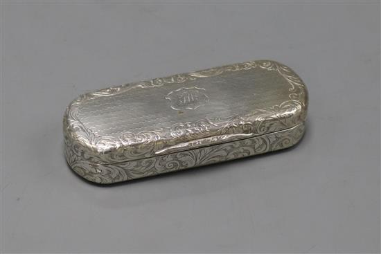 A Victorian engraved silver oval snuff box with silver gilt interior by Nathaniel Mills, Birmingham, 1843?, 89mm.